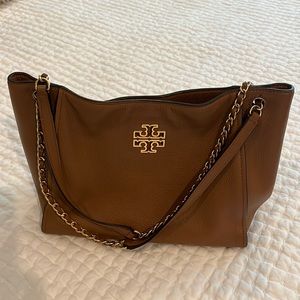 Tory Burch brown/tan purse with metal/leather braided straps.